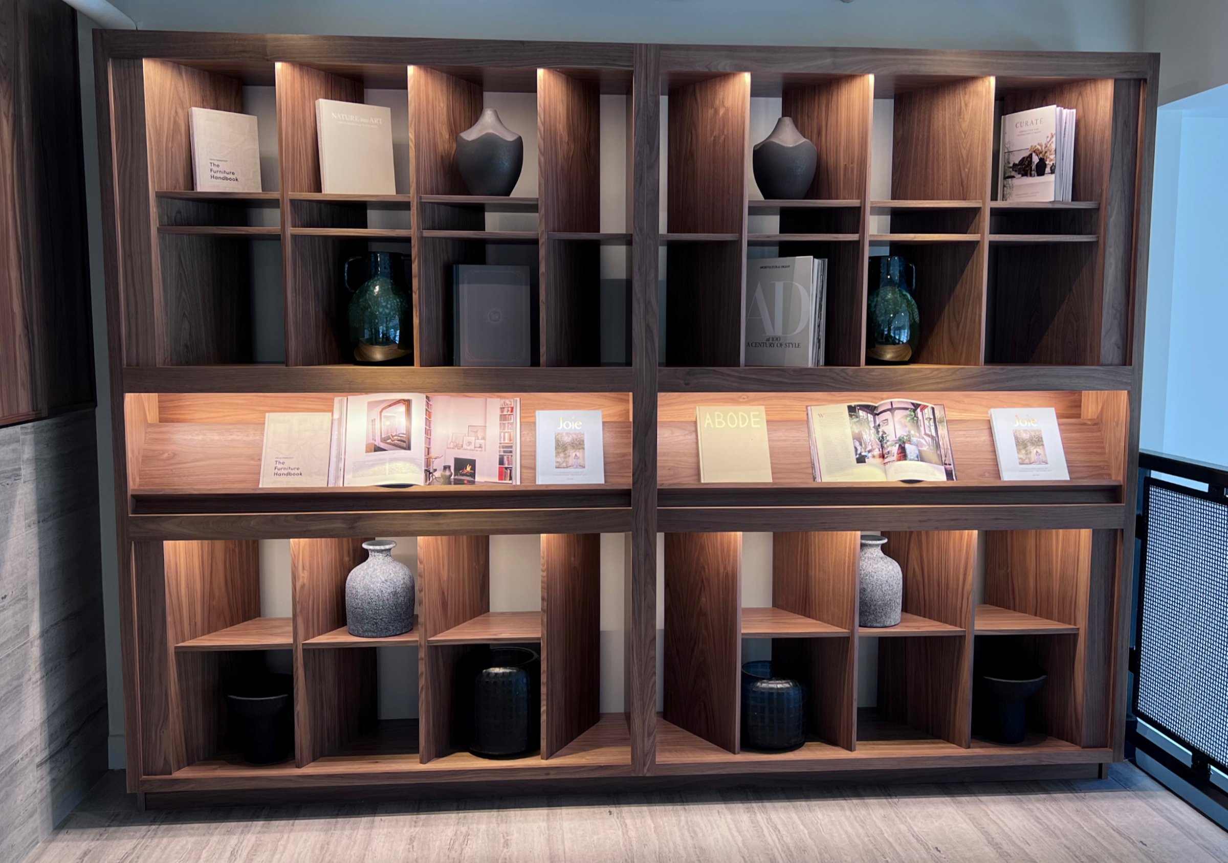 Built-in walnut bookshelf wall with display shelving